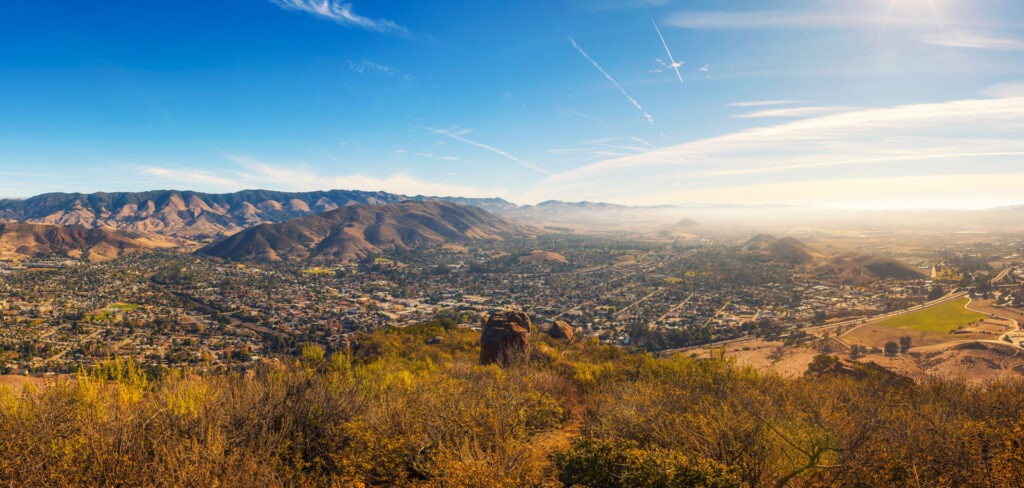 Aerial view of San Luis Obispo in California from the hiking trail to Cerro Peak. Cerro is part of the chain of peaks called the Nine Sisters and is popular for hiking, jogging and mountain biking.